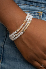 Load image into Gallery viewer, Paparazzi 🔆 How Does Your Garden GLOW - White Bracelet
